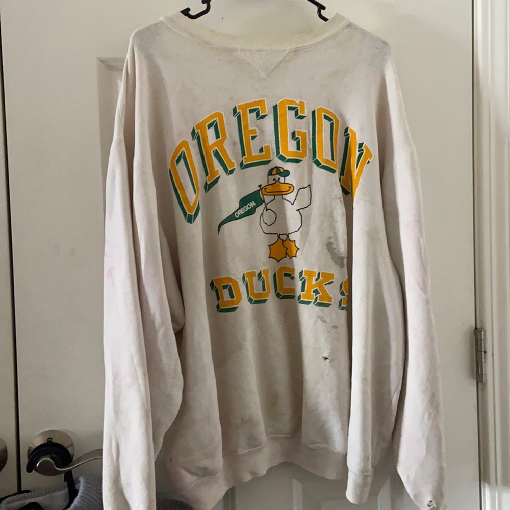 Vintage Oregon Ducks sweater in rough condition